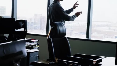 Man Using Virtual Reality Headset in Office