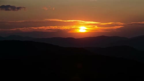 Time Lapse Sunset over Mountain Range