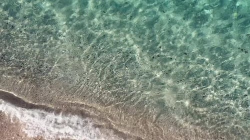 Aerial View of Ocean Waves on Tropical Sandy Beach