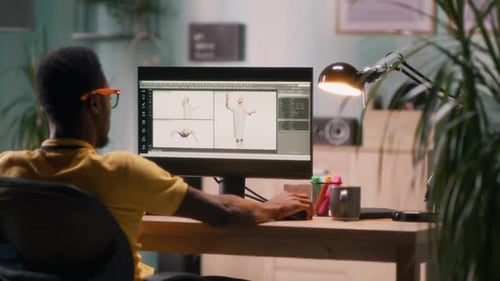 Diseñador 3D negro que crea un modelo humano