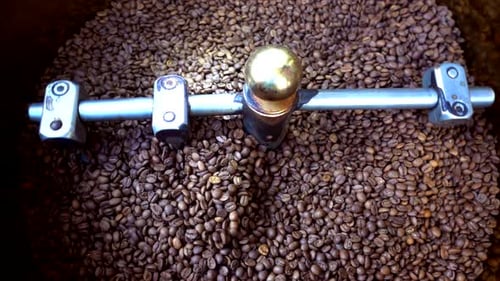 Coffee Beans being Stirred during Roasting Process