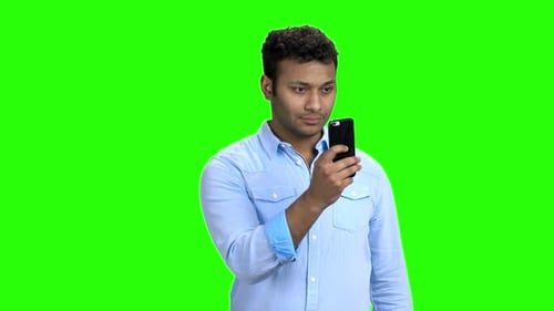 Man Using Phone on Chroma Key Green Screen