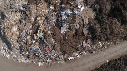 Landfill Overflowing with Garbage from Aerial View