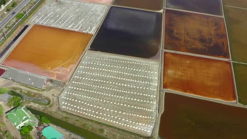 Phetchaburi Salt Flats Naklua Farms and Farmers Collecting Salt in Phetchaburi Thailand