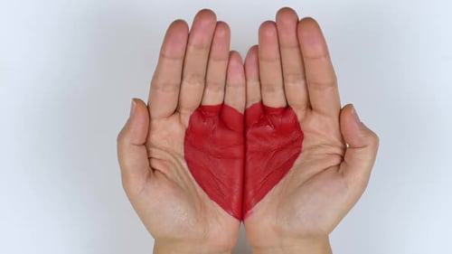 Hands Forming a Heart Shape Together