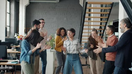 Slow Motion of Happy Businesspeople Dancing in Office Enjoying Corporate Party