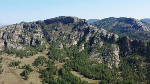 Aerial Photography Of A Mountain Range On A Summer Day