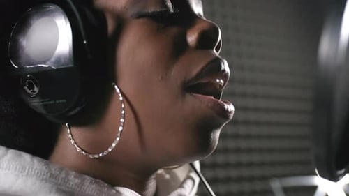 Singer Recording Soulful Song in Studio