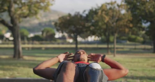 Front view man with prosthetic leg doing abs