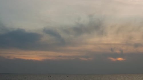 Golden Sunset with Dramatic Clouds and Ocean