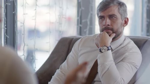 Caucasian Businessman Listening to His Interlocutor