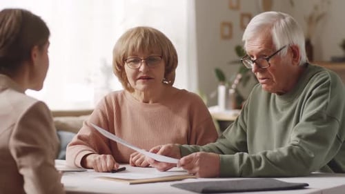 Advisor Meeting with Senior Couple at Home