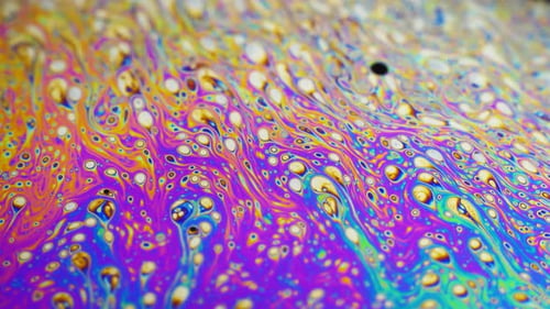 Erstaunlicher bunter Hintergrund der Bewegung, mehrfarbige Oberfläche der Seifenblase