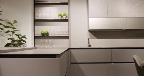Modern Minimalist Kitchen with Sleek Grey Cabinets
