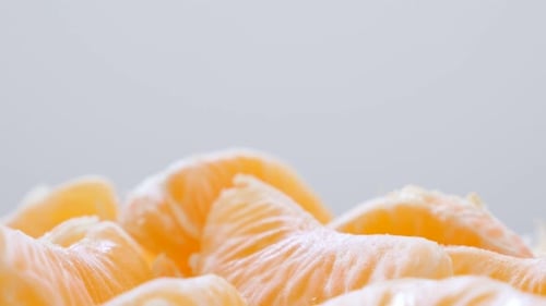 Fruit Citrus tangerina orange family pile food background 4K 3840X2160 30fps UltraHD tilting foota