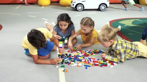 Children Building Blocks in Kindergarten