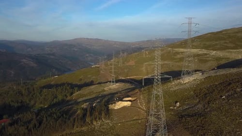 Electrical Towers in Expansive Mountainous Rural Landscape