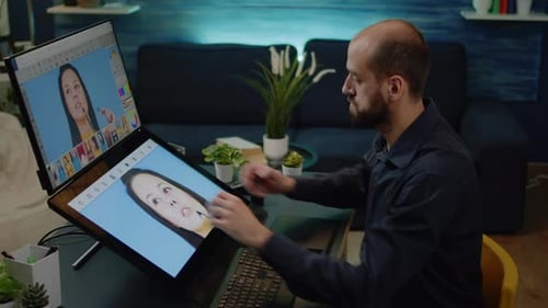 Man Editing Photo on Large Tablet Monitor