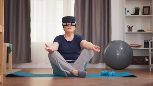 Senior Woman Using VR Headset for Fitness