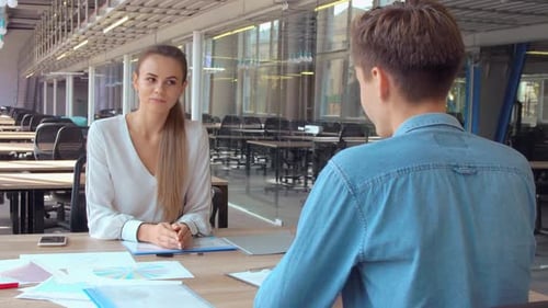 Business Meeting and Handshake in Open Office