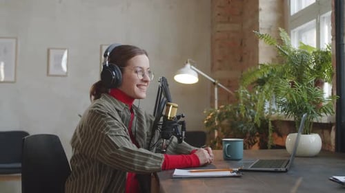 Female Host Recording Podcast in Studio