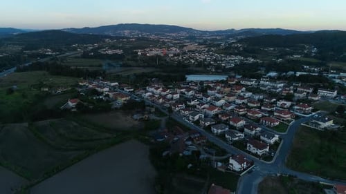 Aerial View of Residential Houses in Suburban Rural Area at Sunset
