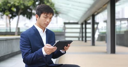 Businessman Use of Tablet Computer