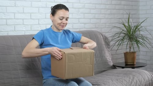 Woman Receives Unwanted Package Indoors