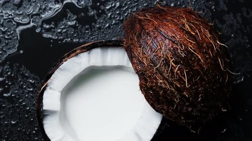 Split Into Two Halves Coconut on a Black Background