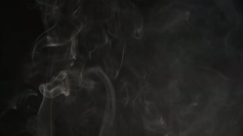 Close up smoke over black background