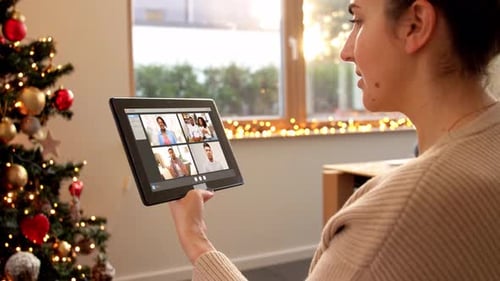 Woman Video Chatting at Christmas Time