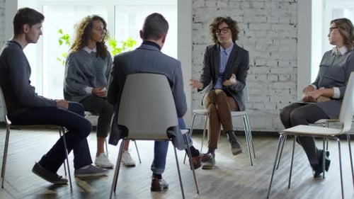 Adults in Group Therapy Session