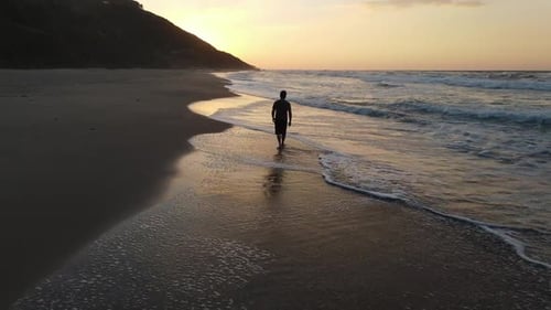 Walking Beach Sunset