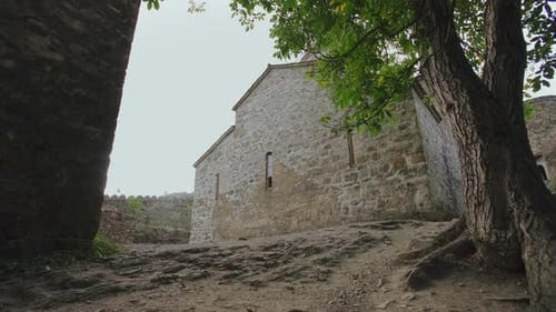 Ancient Defensive Masonry Fortress with Towers, Battlements and Monastery. Defensive Buildings