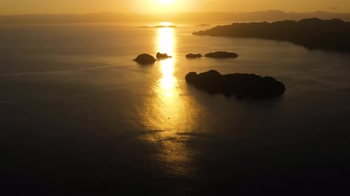 Golden Sunset Over Tropical Islands From Above