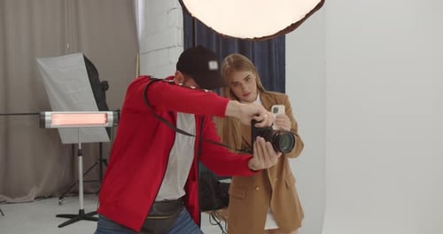 Photographer and Woman in a Fashion Studio