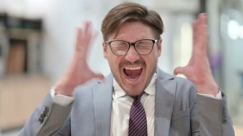 Stressed Man Shouting in an Office Environment