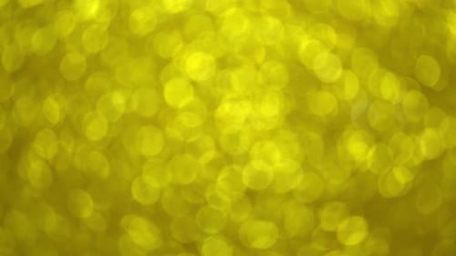 Rotationsgoldener Bokeh-Hintergrund