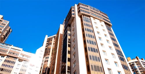 City Buildings And Sun Reflection