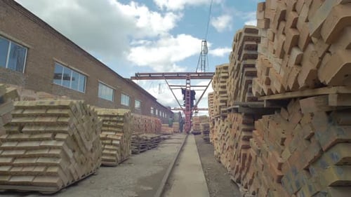 Pile of bricks outside a factory