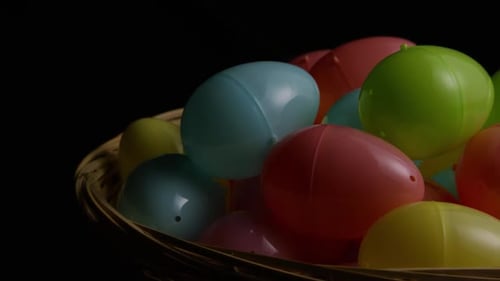 Basket Overflowing with Colourful Easter Egg Decorations