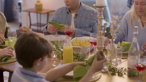 Family Enjoying Festive Dinner Together at Home