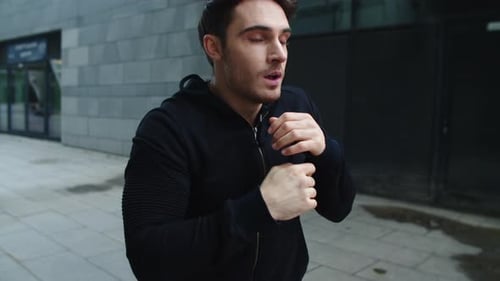 Closeup Sport Man Boxing Outdoor in Slow Motion, Fighter Man Training Punch