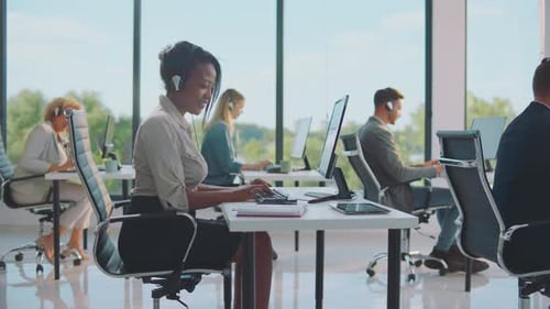 Cheerful woman working in office