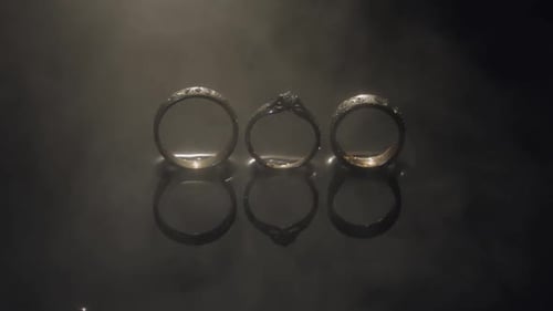 Wedding Rings Displayed in Smoky Studio Setting