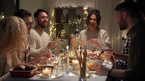 Friends Enjoying Festive Dinner at Cozy Home
