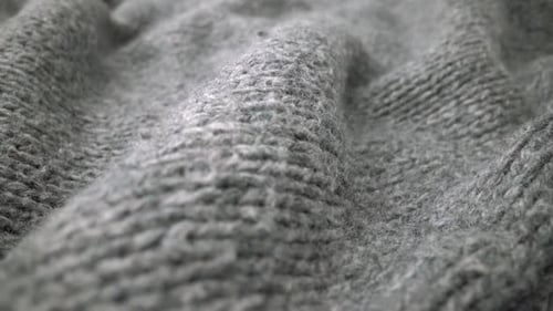 Extreme Detail View of Sheep Wool Cloth Texture Flowing in Macro Dolly Shot