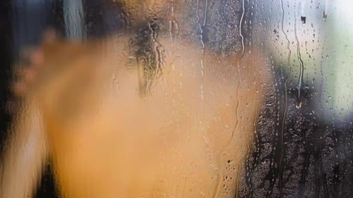Water Drops Run Down Glass Cabin Wall Woman Enjoys Shower