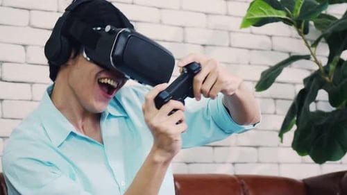 Man Plays VR Video Games With Controller