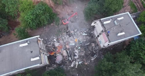 Aerial Shot of Pulling Down the Building By Means of Machinery